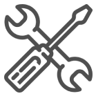 Icon of a crossed wrench and screwdriver in gray on a black background.